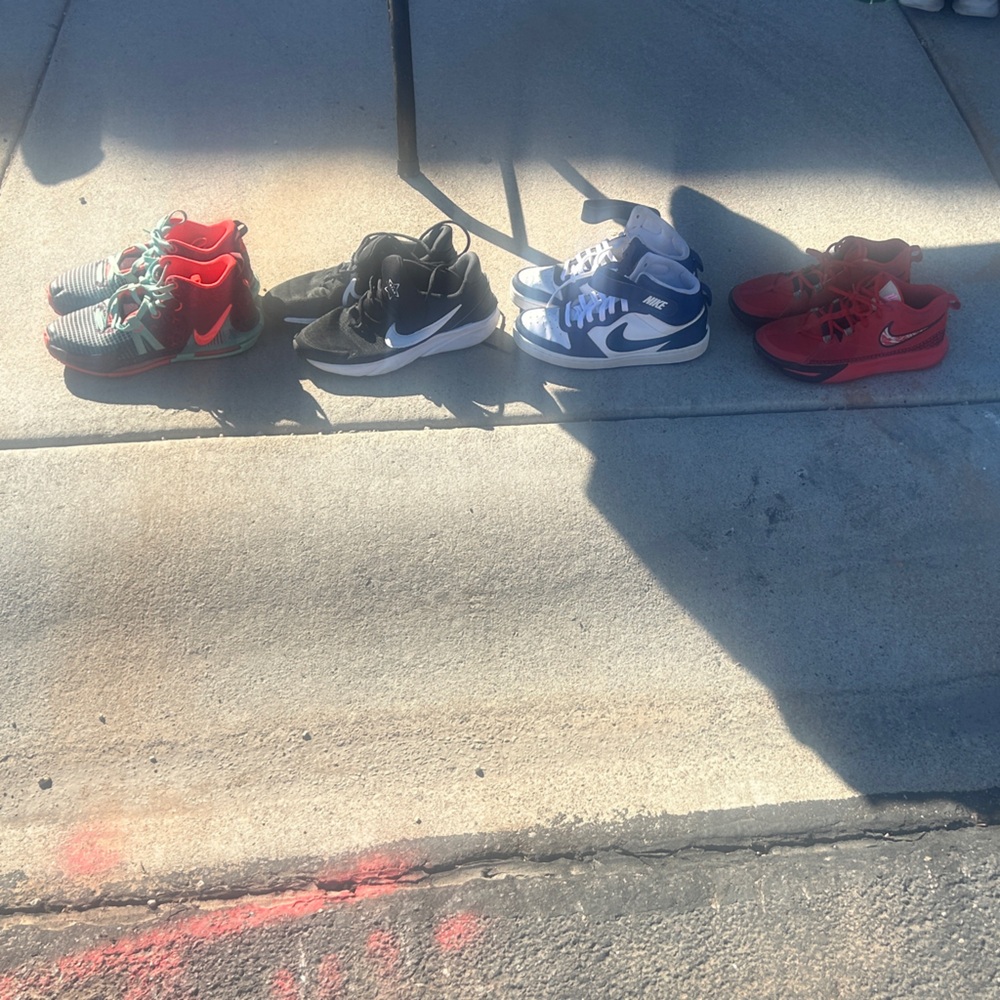 Nike Kids Sneakers in Red, Black, and Blue